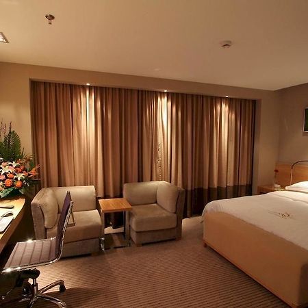 Sunny Resort Hotel Dandong Zimmer foto